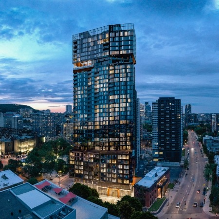 Exterior view of Eleva condos rental project surrounded by Downtown Montreal.